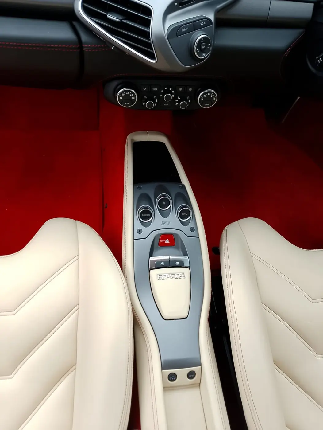 Cream leather Ferrari seats cleaned and conditioned in Stratford-upon-Avon